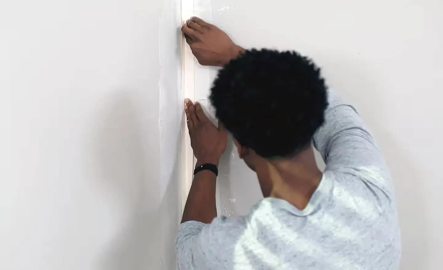 Additional thin coats of joint compound feathered to blend a drywall joint into the wall
